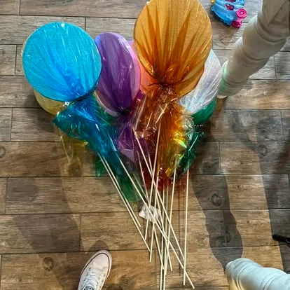 Colorful handmade lollipops arranged for a product photograph
